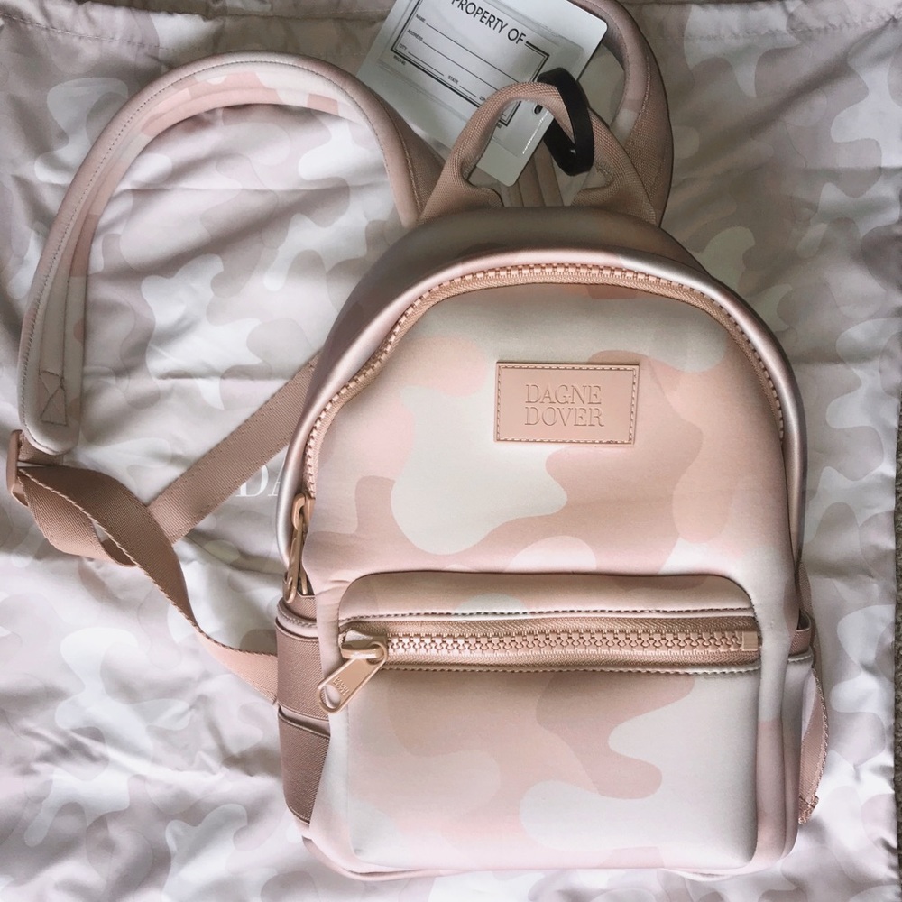 Dagne Dover tan and pink camouflage backpack